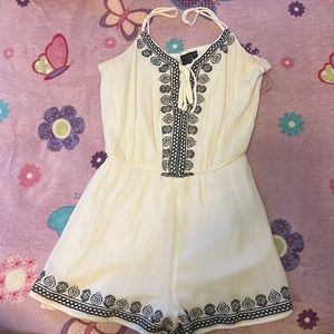 A white and black romper